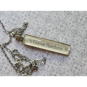 Grayson Hawthorne pendant necklace made with The Inheritance Games book pages